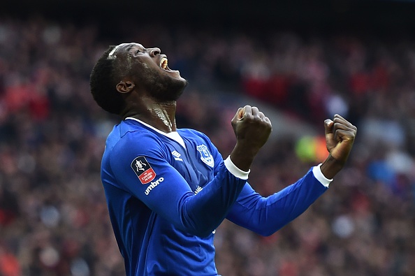 Everton's Belgian striker Romelu Lukaku celebrates after Manchester United's English defender Chris Smalling turned in a cross from Everton's Spanish midfielder Gerard Deulofeu to score an own goal to equalise the scores 1-1 during the English FA Cup semi-final football match between Everton and Manchester United at Wembley Stadium in London on April 23, 2016. / AFP / BEN STANSALL / NOT FOR MARKETING OR ADVERTISING USE / RESTRICTED TO EDITORIAL USE (Photo credit should read BEN STANSALL/AFP/Getty Images)