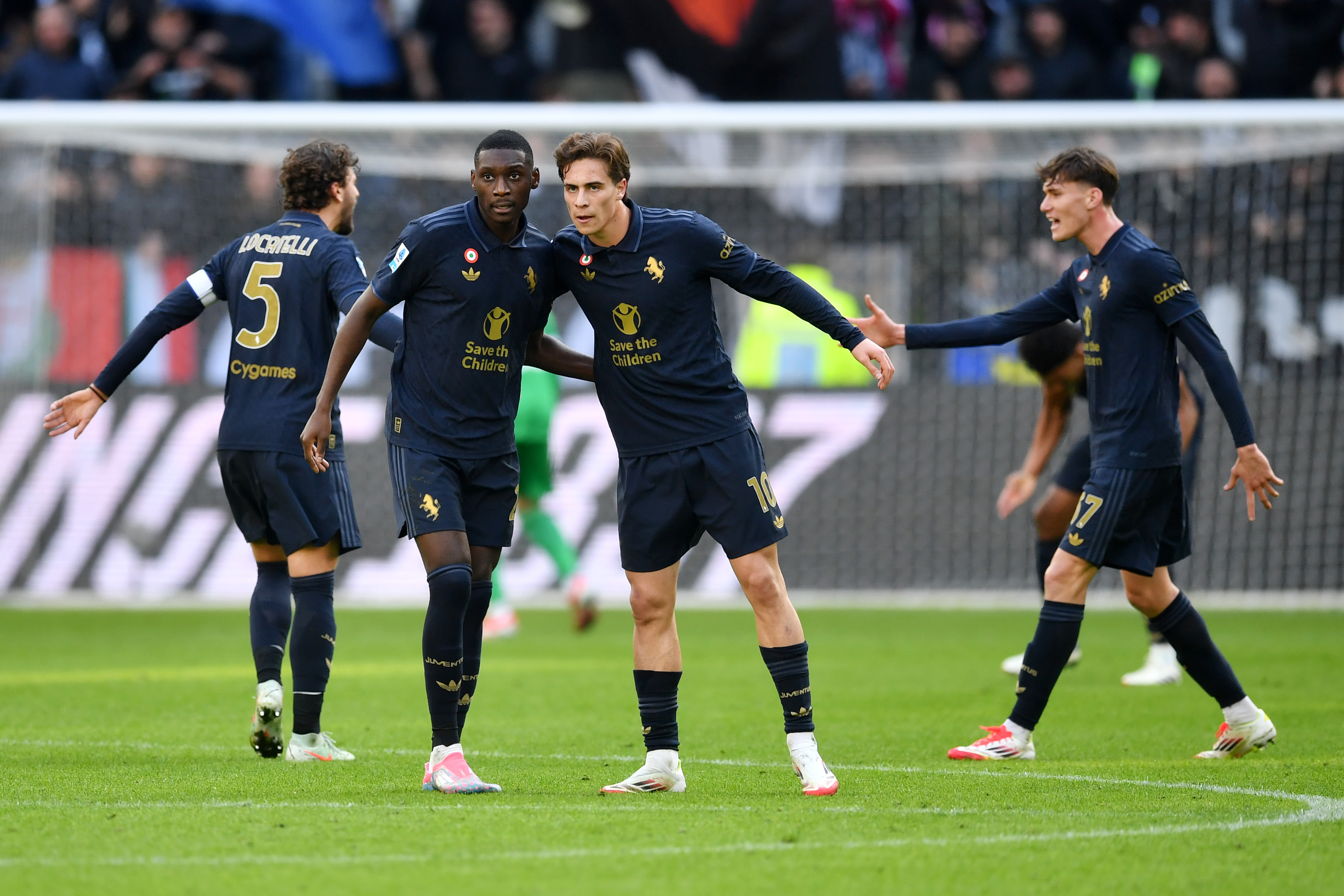 Juventus players celebrate scoring against Empoli