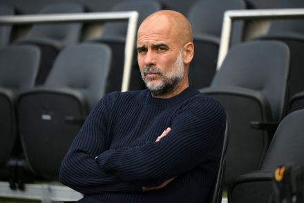 Pep Guardiola lookin on