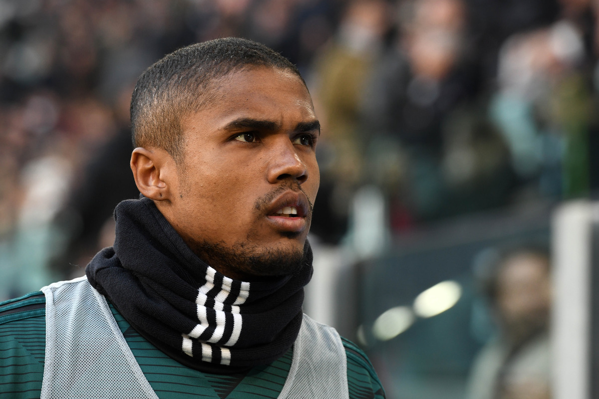 Douglas Costa looking on