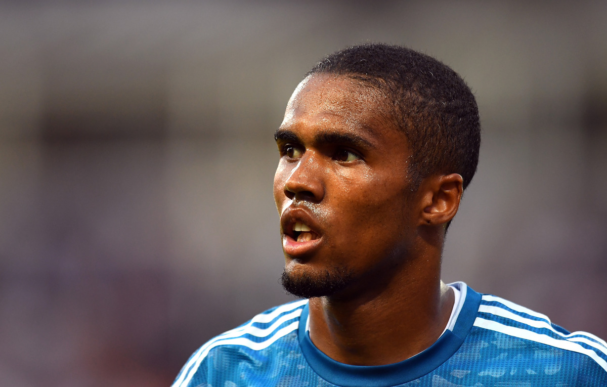Douglas Costa looking on
