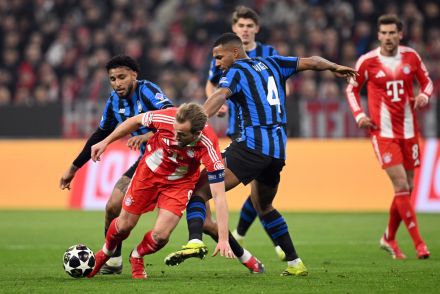 Harry Kane battling with Isak Hien and Ederson