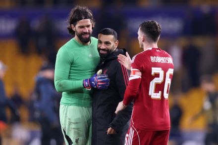 Andy Robertson with Mo Salah and Alisson