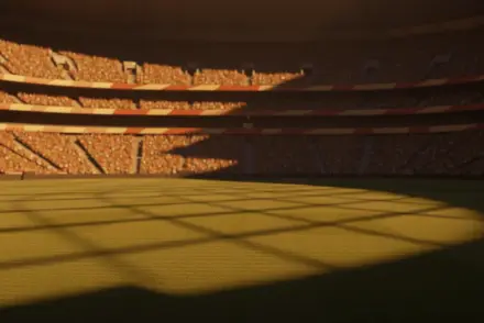 Golden-hour lit stadium with packed stands in Australian and Egyptian flag colours, dramatic shadows across empty pitch.