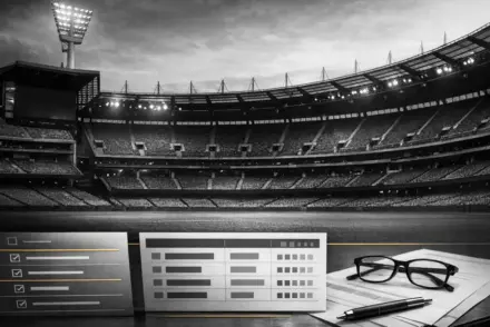 Professional sports betting guide editorial image with stadium architecture and structured design elements in black, white and gold tones