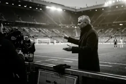 Juventus coach silhouette calmly addressing criticism after a tense home victory under stadium lights