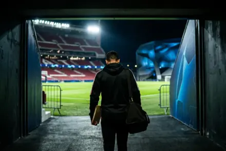 Experienced left-back walking through a stadium tunnel amid Atletico Madrid transfer uncertainty