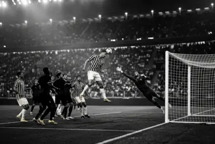 Juventus defender scores a stoppage-time header against Milan at Allianz Stadium