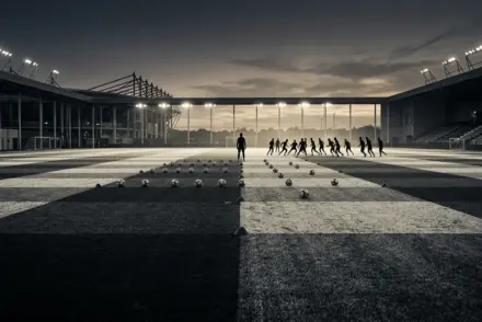 Black-and-white Juventus training ground scene symbolizing pressure in the top-four race